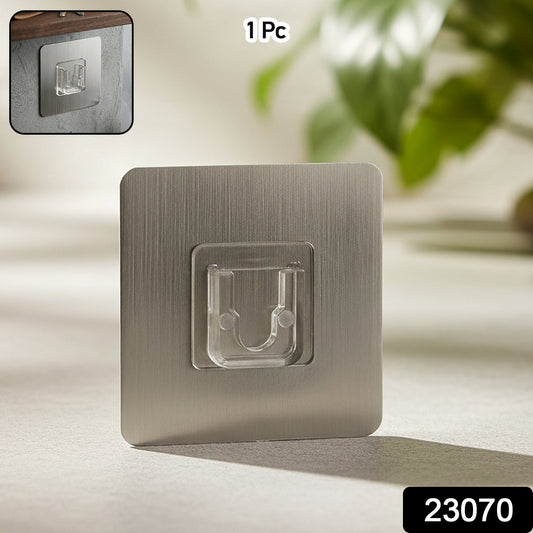 Strong adhesive wall hook attached to smooth surface for hanging items